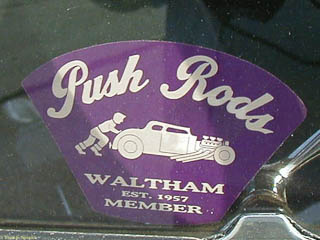 Window stick for "Push Rods" car club showing a man pushing his hot rod
