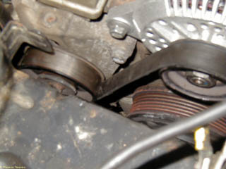 Place serpentine belt under the idler pulley so the belt can be tensioned