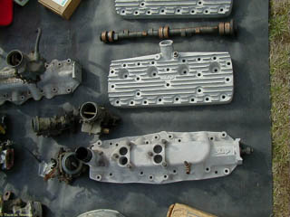 After market Ford flathead V8 heads and dual carburetor intake manifold made by Sharp